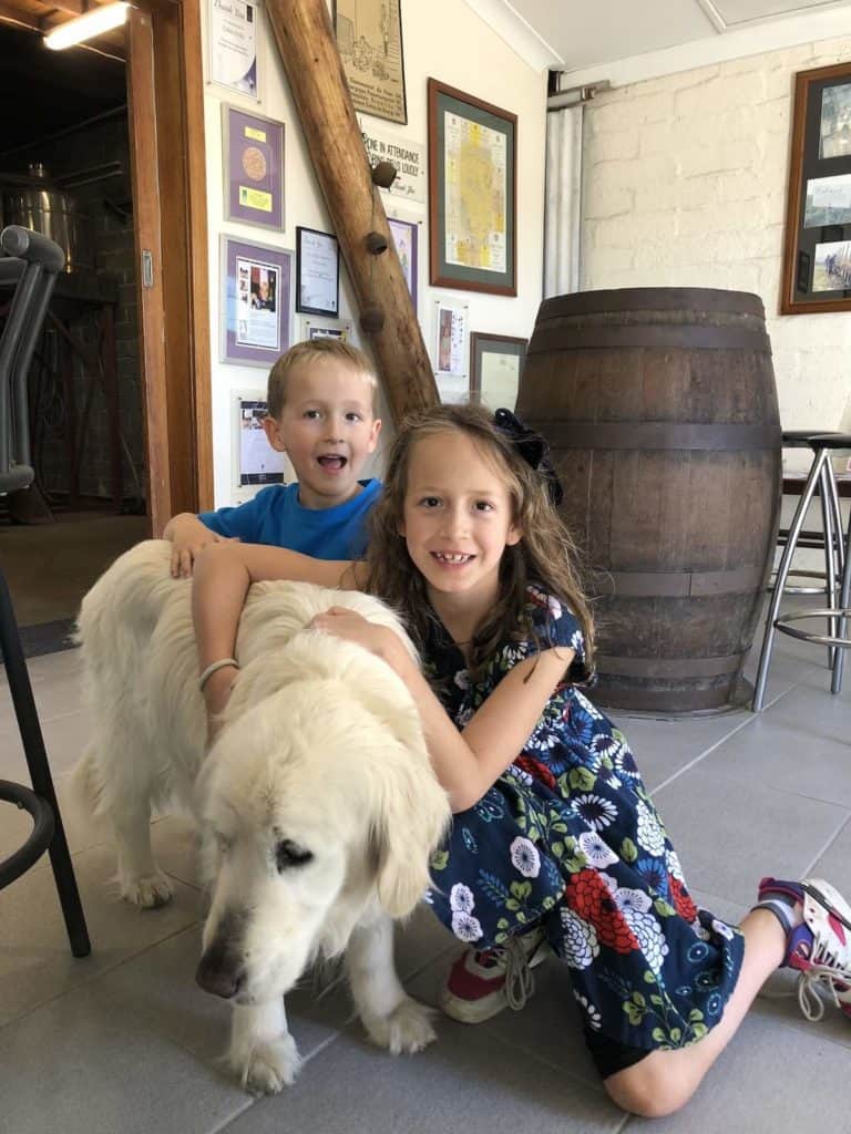 Kids with wine dog in Hunter Valley winery