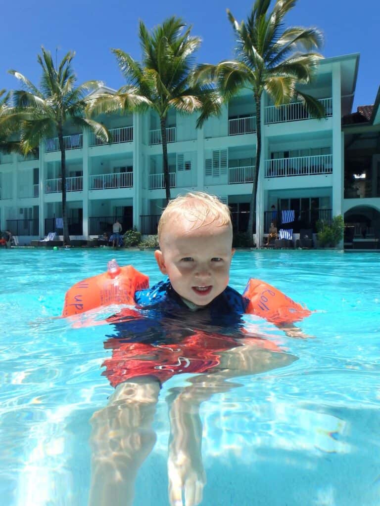 Baby in pool at Peppers Beach Club Port Douglas