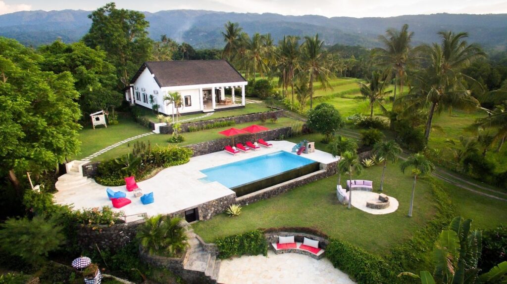 Aerial view of Villa Bloom with swimming pool and gardens.