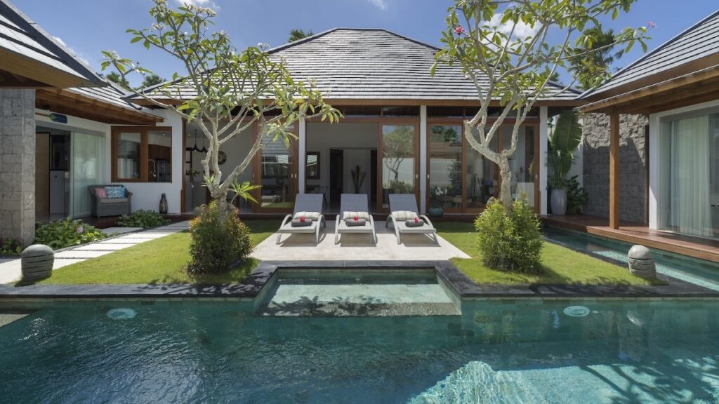 Villa Sanook villa in Bali swimming pool with sun loungers.