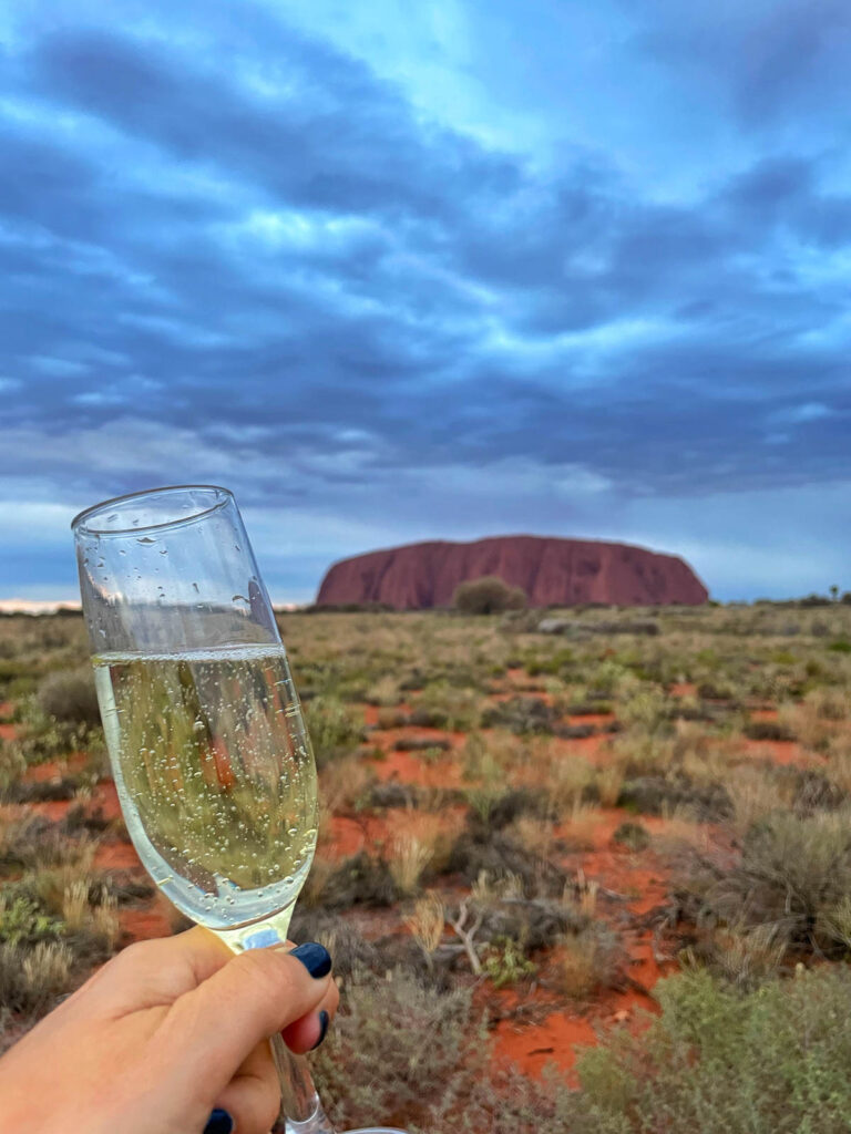 Uluru with champagne glass