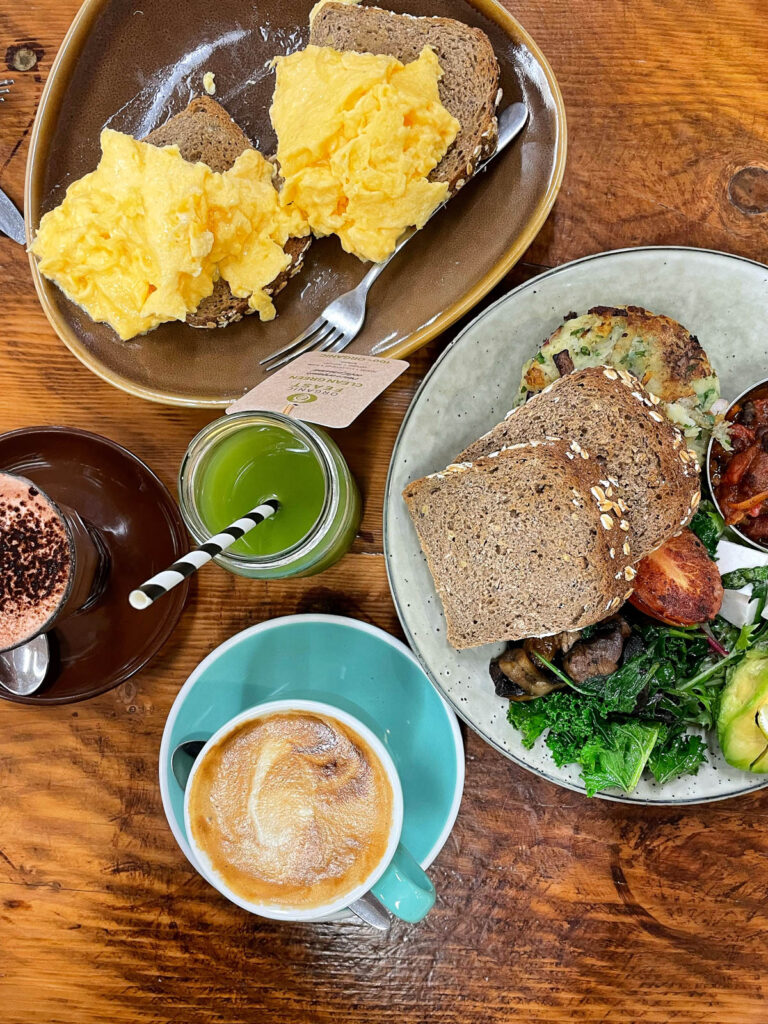 Selection of breakfast dishes on table in Organic Taste Maitland