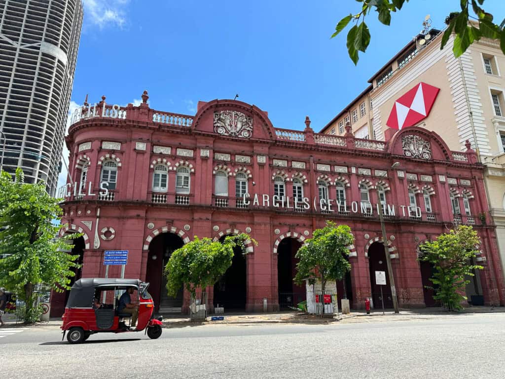 Heritage building with a tuk tuk in Colombo, Sri Lanka.