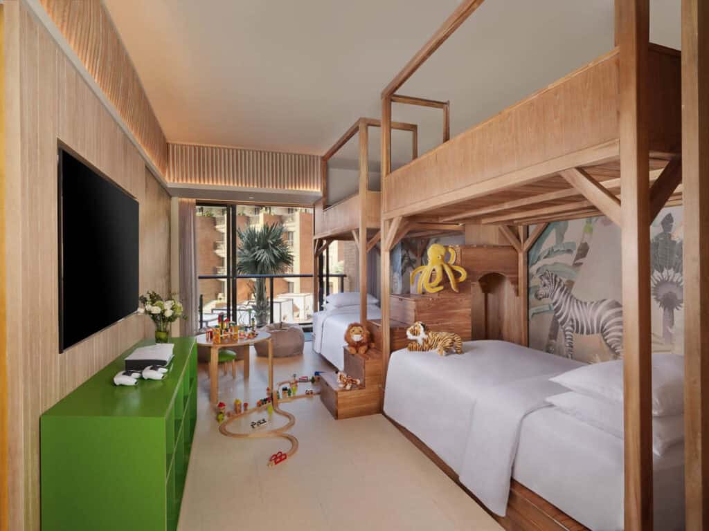Family room with bunk beds at Novotel Ubud.