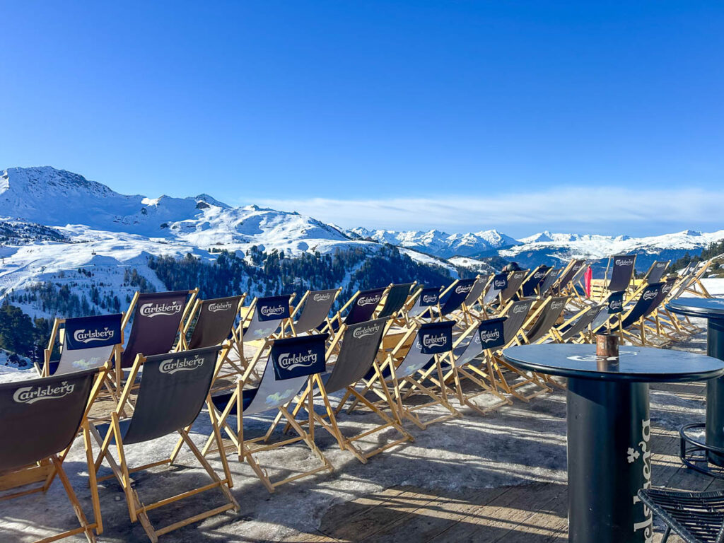 Deckchairs on restaurant terrace in Les Arcs, France.