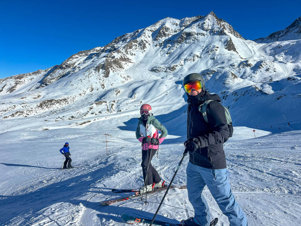 Family skiing in Les Arcs, France.